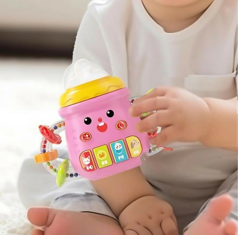 Baby's First Musical Friend - Colourful Baby Bottle-Shaped Educational Toy - Pink
